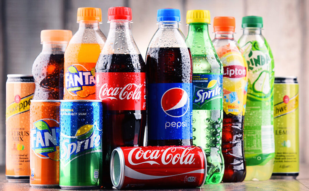 Bottles of assorted global soft drinks